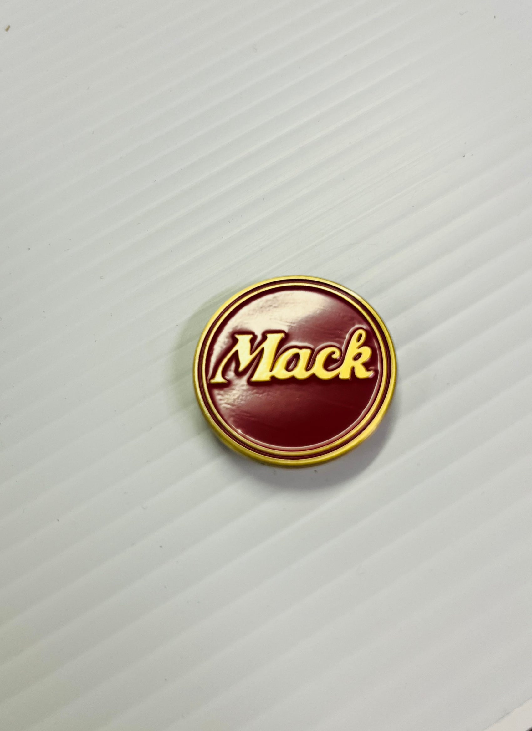 AACC - M2- Mack red/brass round Horn Honker Medallion