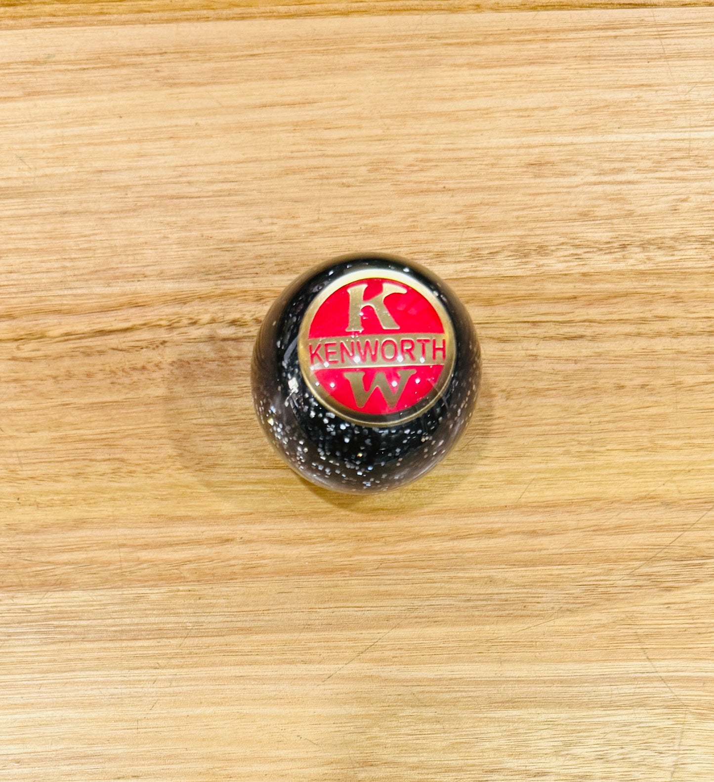 GS-KY17: KENWORTH Black Glitter Round Knob with Round brass/red KW logo