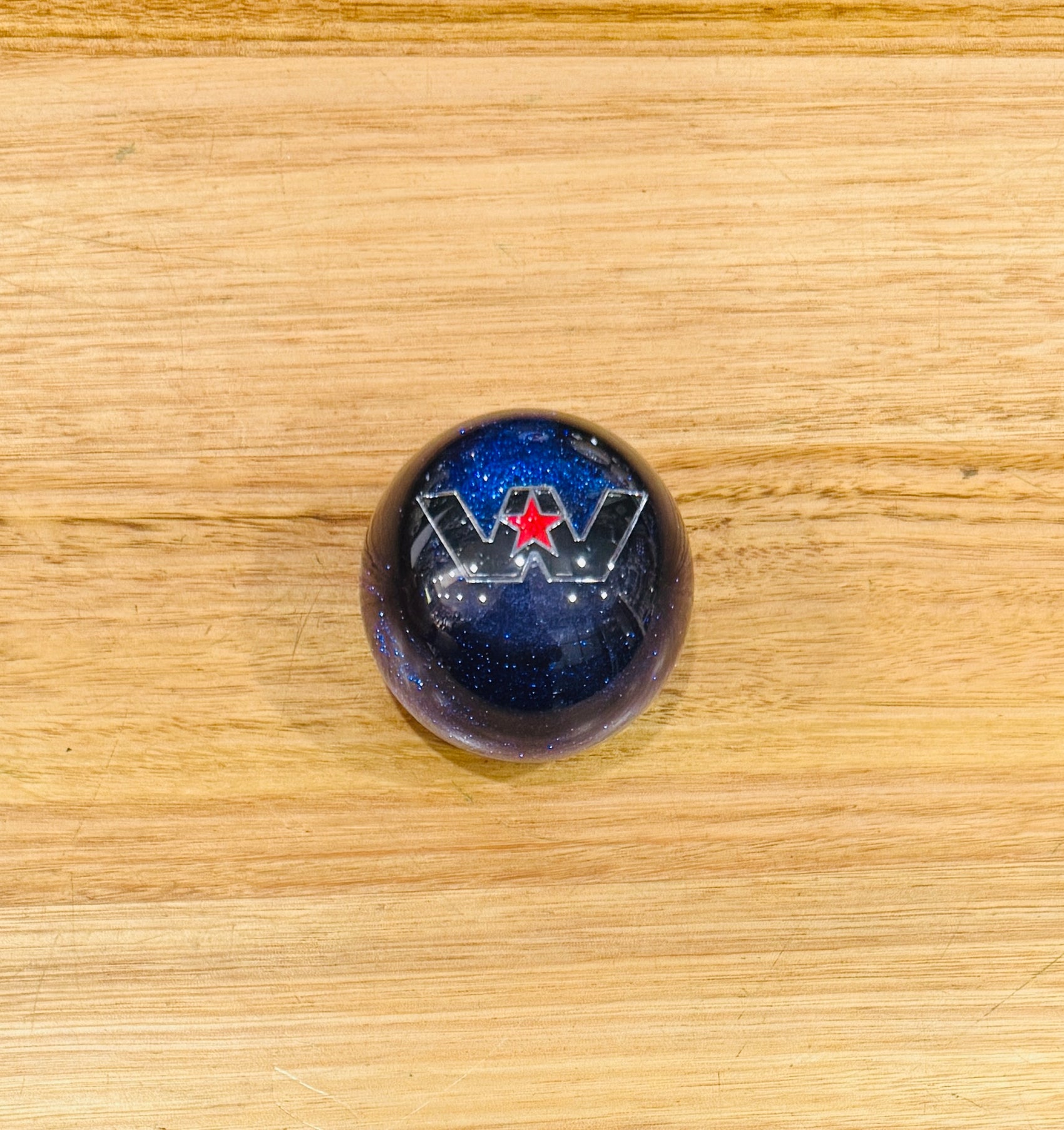 GS-WB1: WESTERN STAR Blue Glitter Gear Shifter Knob with Black W and silver outline