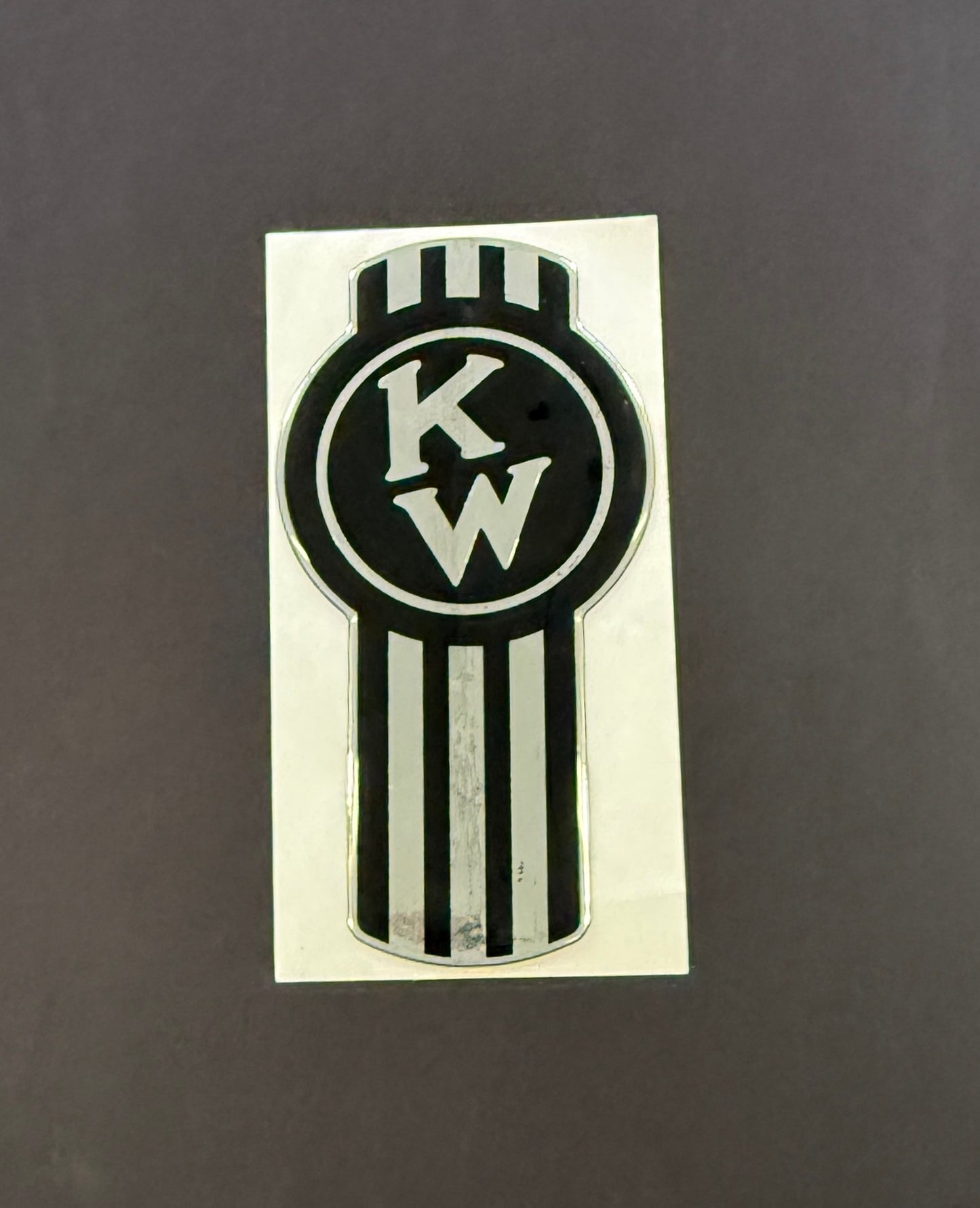 AACC - Kenworth Logo Black/Metallic silver Emblem Skin 2.5 Inch