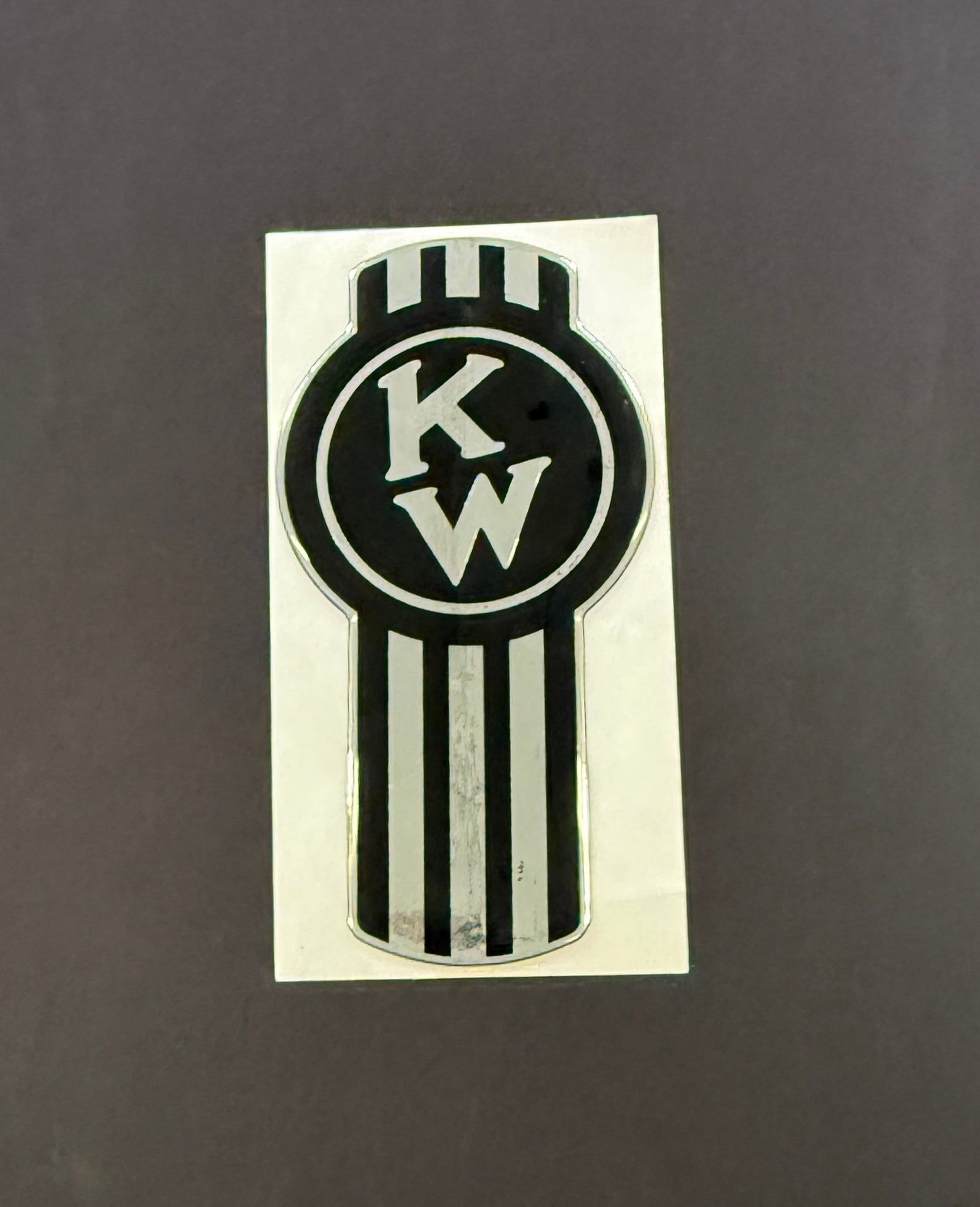 AACC - Kenworth Logo Black/Metallic silver Emblem Skin 2.5 Inch