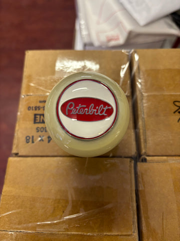 GS-PW1 : White Round Knob with Red Peterbilt Emblem and Surrounding Ring