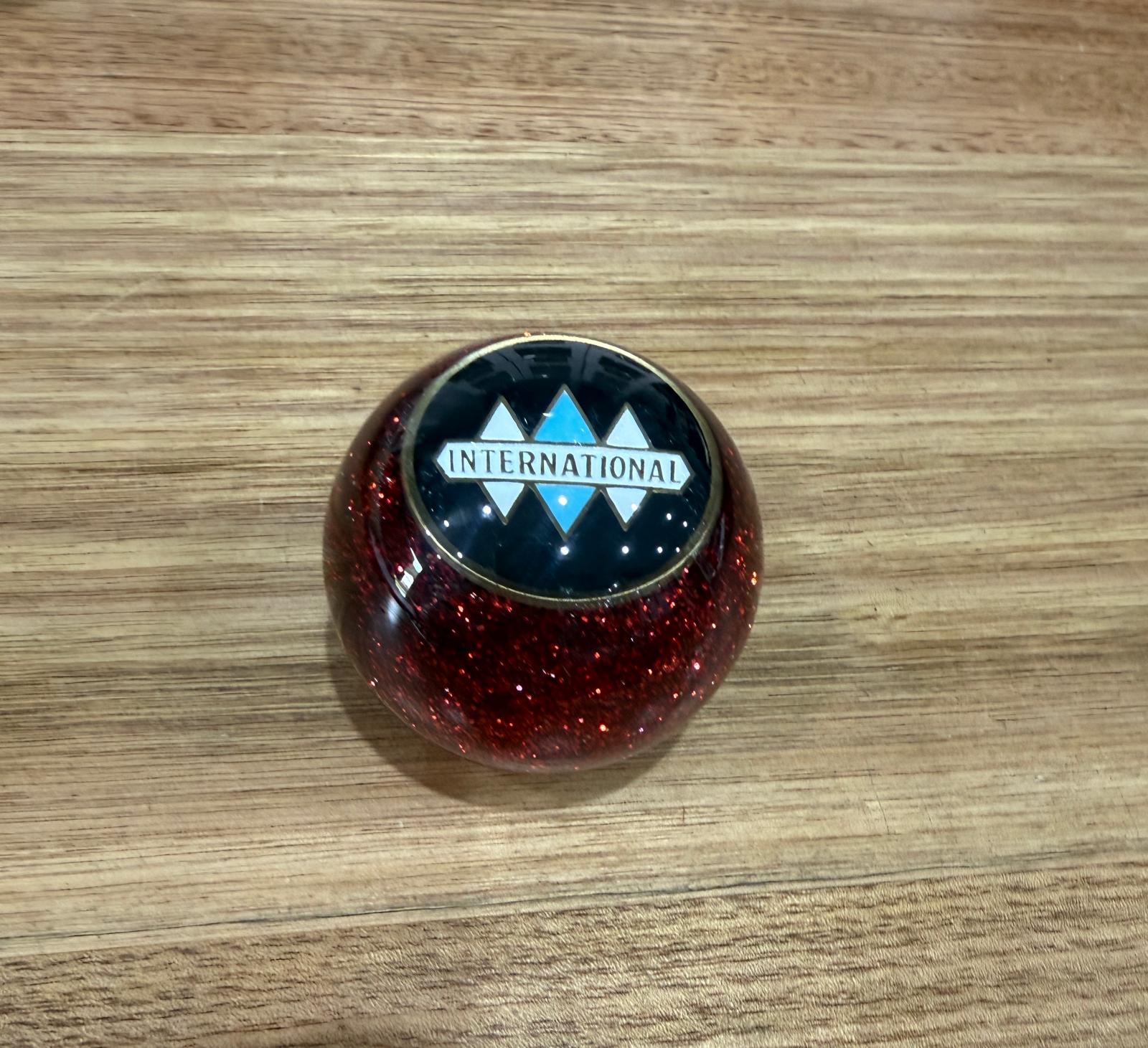 GS-IR1 : Red Glitter Round Gear Shifter Knob with Round black/white/blue/brass INTERNATIONAL detail