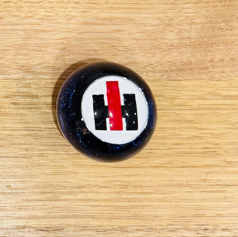 GS-IB2: Blue Glitter Round Knob with Round white/red/black square INTERNATIONAL logo detail